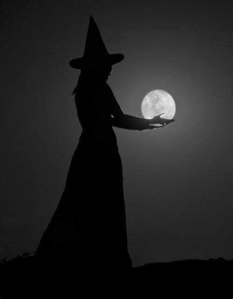 Witch Holding The Moon Pictures Photos And Images For Facebook