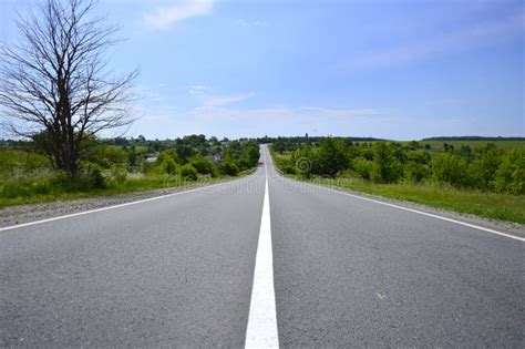 Asphalt Road With Markings Goes Into The Distance Stock Photo Image