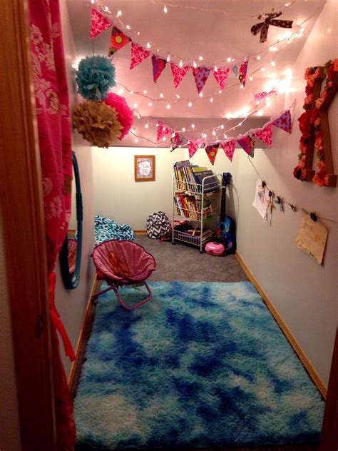 You can design the area under the stairs as a reading nook or a whole playhouse. Under The Stairs Playroom For A Little Girl Features And ...