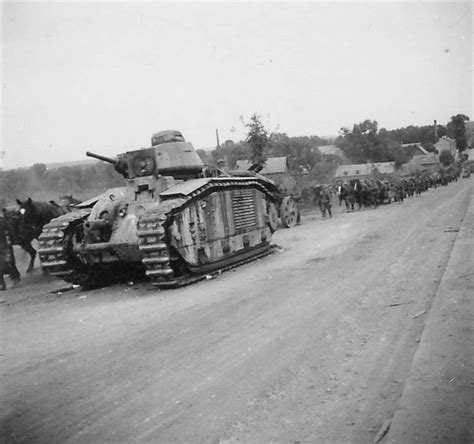 A Column Of German Troops Passes By The French Tank Char B1 Bis No 238