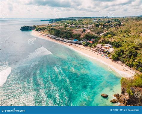 Beautiful Coastline With Turquoise Ocean And Waves In Bali Aerial View