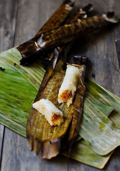 Savoury Glutinous Rice Wrapped In Banana Leaves With Spicy Coconut