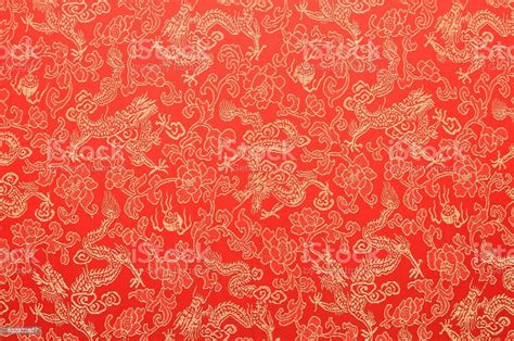 Fragment Of Red Chinese Silk With Golden Dragons And Flowers Stock