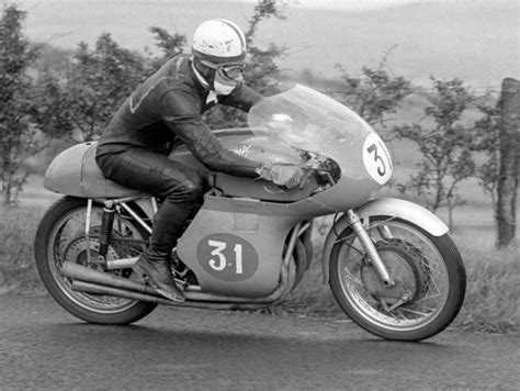 John Surtees Sitting Aboard His Mv Agusta Motorbike During Practice For