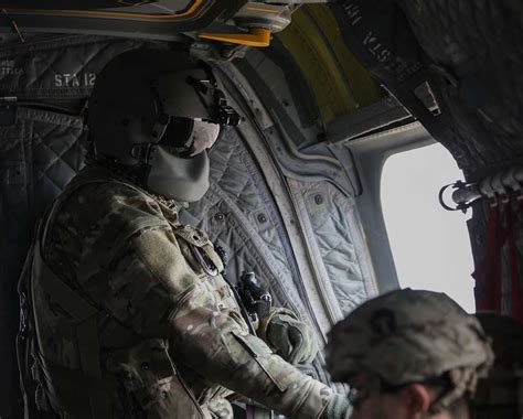 A Us Army Ch 47 Chinook Door Gunner Provides Security Picryl Public