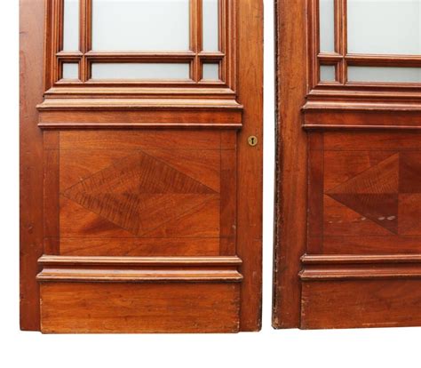 By installing interior door pairs between two rooms, a dining room and a living room for example, you can choose to keep the double doors closed to separate the rooms. Pair of Half Glazed Mahogany Interior Double Doors For Sale at 1stDibs