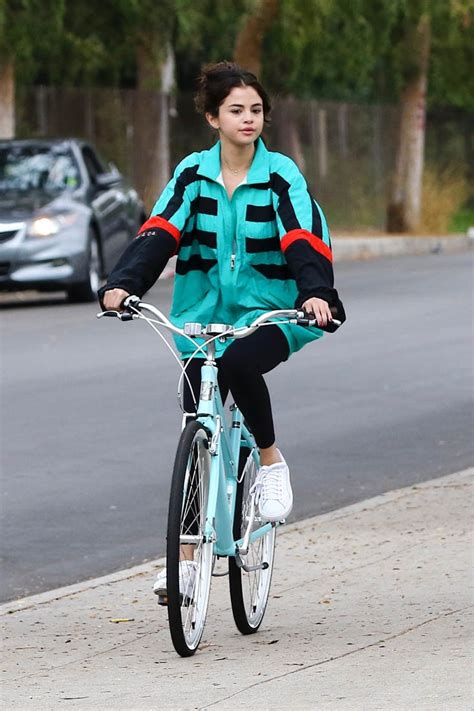 Selena Gomez Wears The Weeknds Jacket While Out For A Bike Ride After