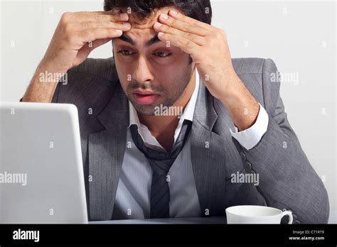 Businessman Stressed At Work Stock Photo Alamy