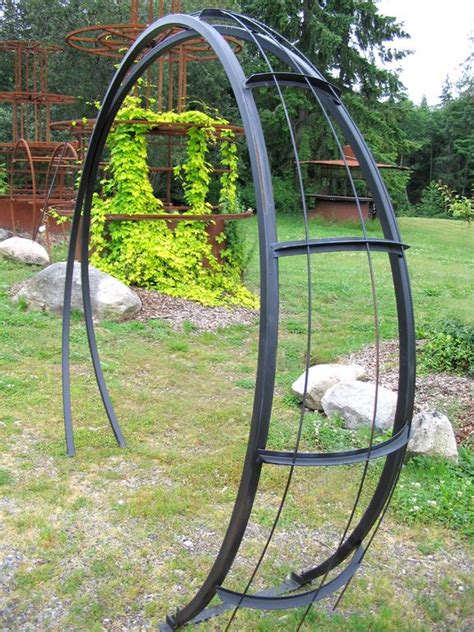 Tap two small nails, side by side, at the top of each post so they are hidden comment on this project. moonbeam metal garden arch | Garden arch, Metal arbor ...
