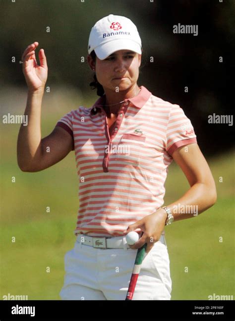 Lorena Ochoa Of Mexico Waves After Making Her Putt On The 11th Hole During The First Round Of