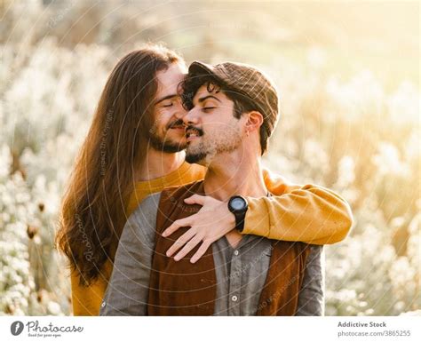 Sensual Lesbian Couple In Sunny Winter Field A Royalty Free Stock