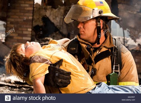 Firefighter Rescue Child Stock Photos And Firefighter Rescue Child Stock