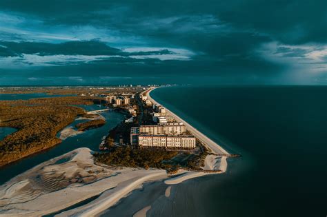 Aerial Photography Of Buildings Near Coastline Usa Shore Coast Sand