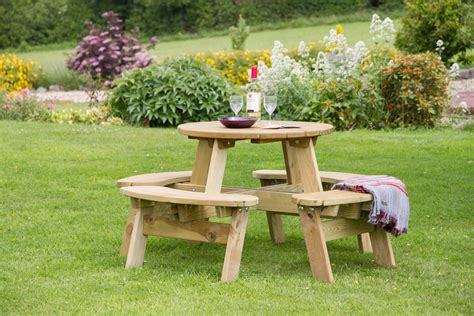 If you need a backyard table but you haven't found the perfect design for your needs yet, you should. Katie Round Picnic Table - Penrallt Garden Centre