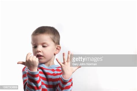 Young Boy Counting On Fingers High Res Stock Photo Getty Images