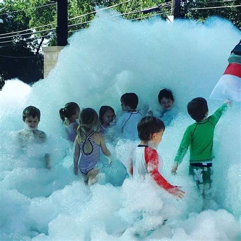Kids Line Up To Play In The Foam Machine Bubbles The Foam Powder Packs