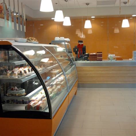 Interior Designers For Cakeshop Orange Interior