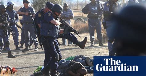 south african police open fire on striking miners in pictures world news the guardian