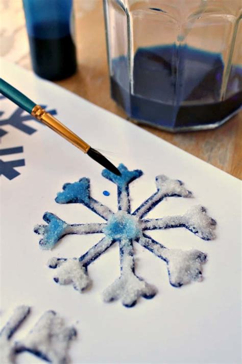 Salt Glue And Watercolor Painting To Make Snowflake Art Snowflakes Art Painting Snowflakes