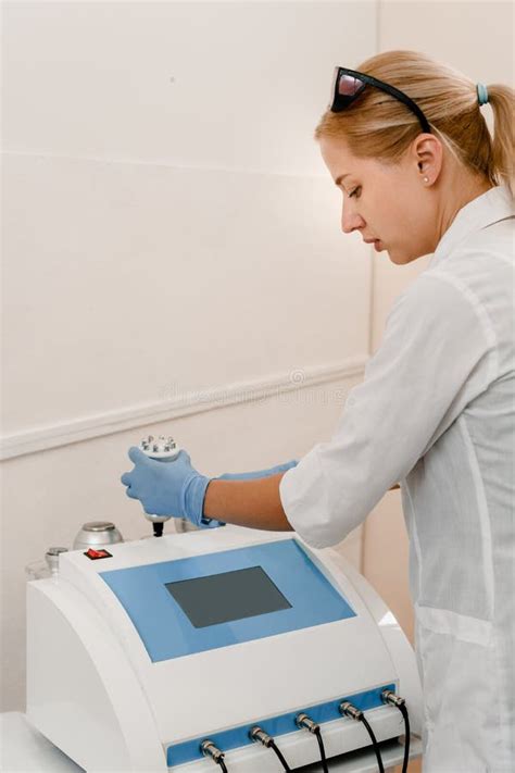 Cosmetologist With Laser Machine Stock Photo Image Of Medicine