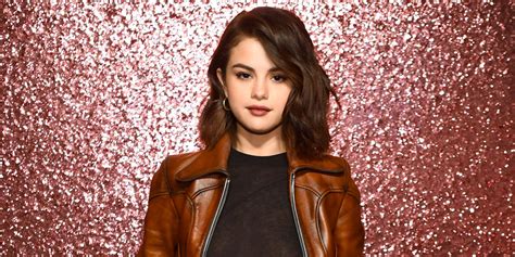 Selena Gomez Is All Smiles During Bike Ride To Meet Fans Following