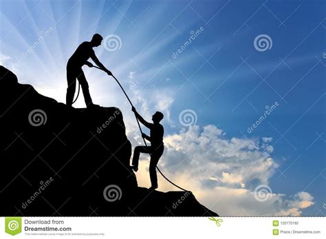 Climber Helps Ascent Of Two Climbers On A Mountain Top Royalty Free