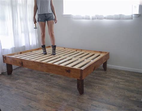 Attaching the trim around the bed frame. Handmade Rustic Wooden Bed Frame | W.O.O.D. | Pinterest ...
