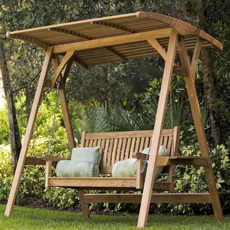 It adds a special uniqueness to a space that's always riddled with this outdoor space is reminiscent of a canopy bed frame but with more area and more places to rest! Veranda Swinging Bench with Canopy | Teak outdoor ...