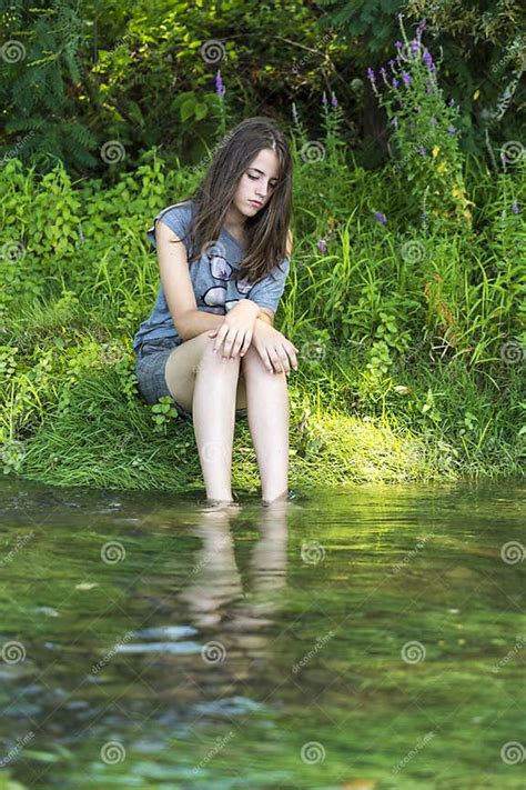 Girl Put Her Feet In The River Stock Image Image Of Relaxation Sitting 61605221