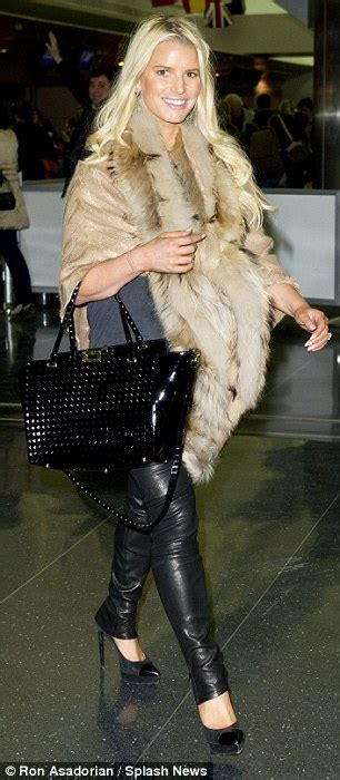 Jessica Simpson Shows Off Slim Pins In Leather Trousers But Covers