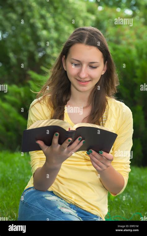 Teen Girl Reading Book Stock Photo Alamy