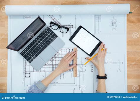 Young Woman Architect Working And Making Blueprint Stock Photo Image