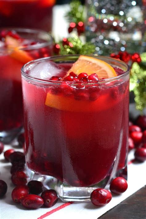 Combine all ingredients except pineapple wedges and sugar in a punch bowl. Christmas Punch - Will Cook For Smiles
