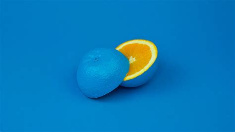 Blue Background Orange Fruit Wallpapers Hd Desktop And Mobile