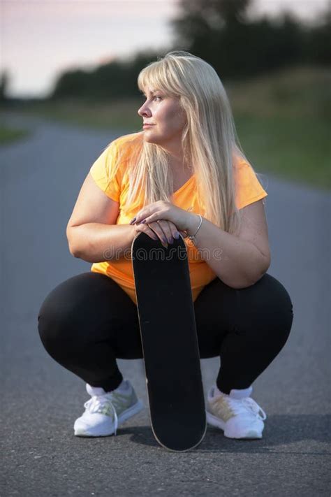 chubby middle age woman in park in romantic dress stock image image of active america 190019197