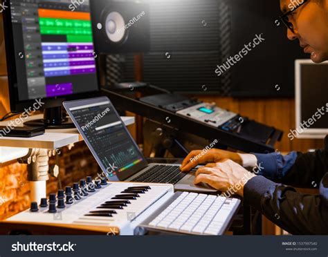 Stock Photo Male Producer Musician Composer Making A Song In Home