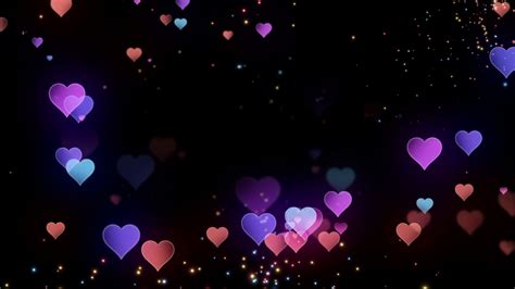 Floating Hearts Glowing Sparkling Particles Stock Motion Graphics Sbv