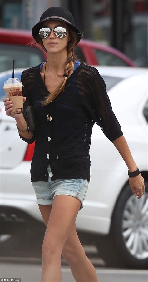 skinny sharni vinson reveals her protruding collarbone as she sips on a calorie laden ice coffee