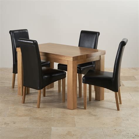 Small clear with black boarder glass dining table and 6 faux leather chairs from homegenies with free uk delivery for only £529. Chunky 4ft Solid Oak Dining Table 4 Black Leather Scroll ...