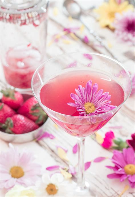 She photographed 20 of the most beautiful flower pot arrangements in her neighbor hood, and this is one of them! Strawberry & Jasmine Wine Cocktail