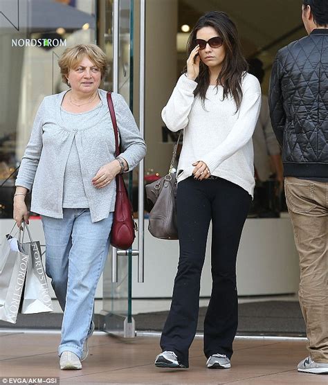 Ferddyjay s Blog Mila Kunis flashes engagement ring as she kisses new fiancé Ashton Kutcher at