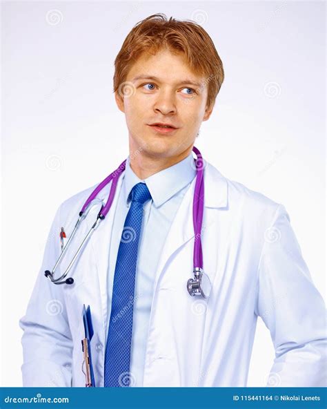 Portrait Of Confident Young Medical Doctor On White Background Stock