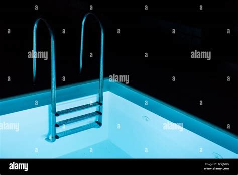 Swimming Pool At Night Stock Photo Alamy