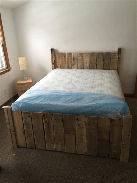 There is a ton of storage space underneath it! DIY Custom-Built Pallet Platform Bed | 101 Pallets