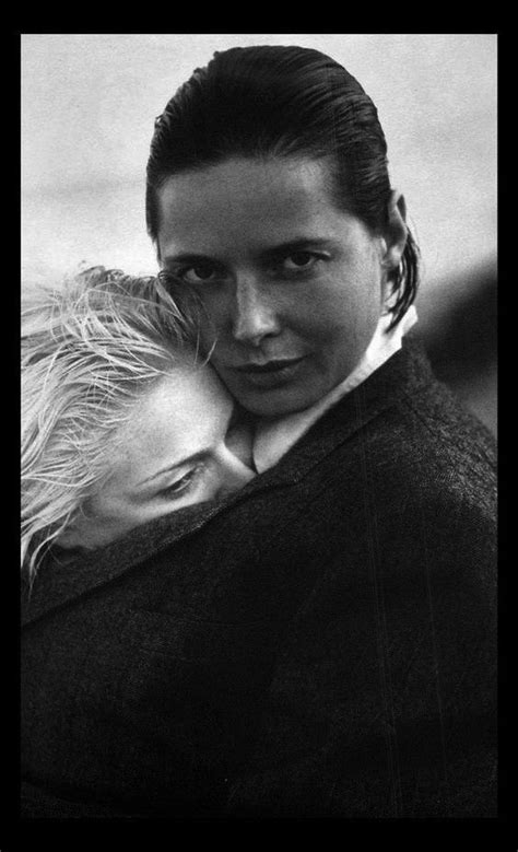 Black And White Photograph Of A Woman Hugging Another Woman