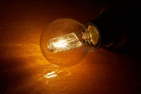 Light Bulb On A Table Stock Image Image Of Electricity 130678465