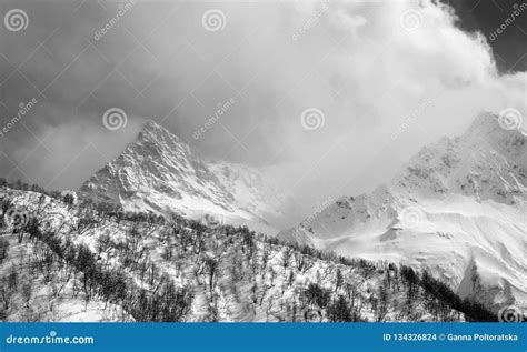 High Mountain Peaks In Fog And Sunlight Cloudy Sky Stock Photo Image