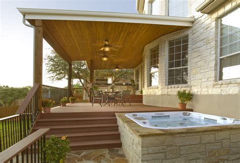 This freestanding structure is supported by posts or columns and the roof is made up of evenly spaced slatted beams. Houston Covered Patio Builder