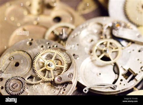 Antique Watch Parts Cogs Mechanisms Springs And Faces Stock Photo