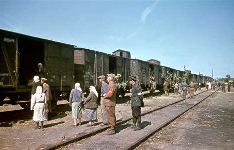Transpress Nz People Entering Boxcars In Ukraine 1943